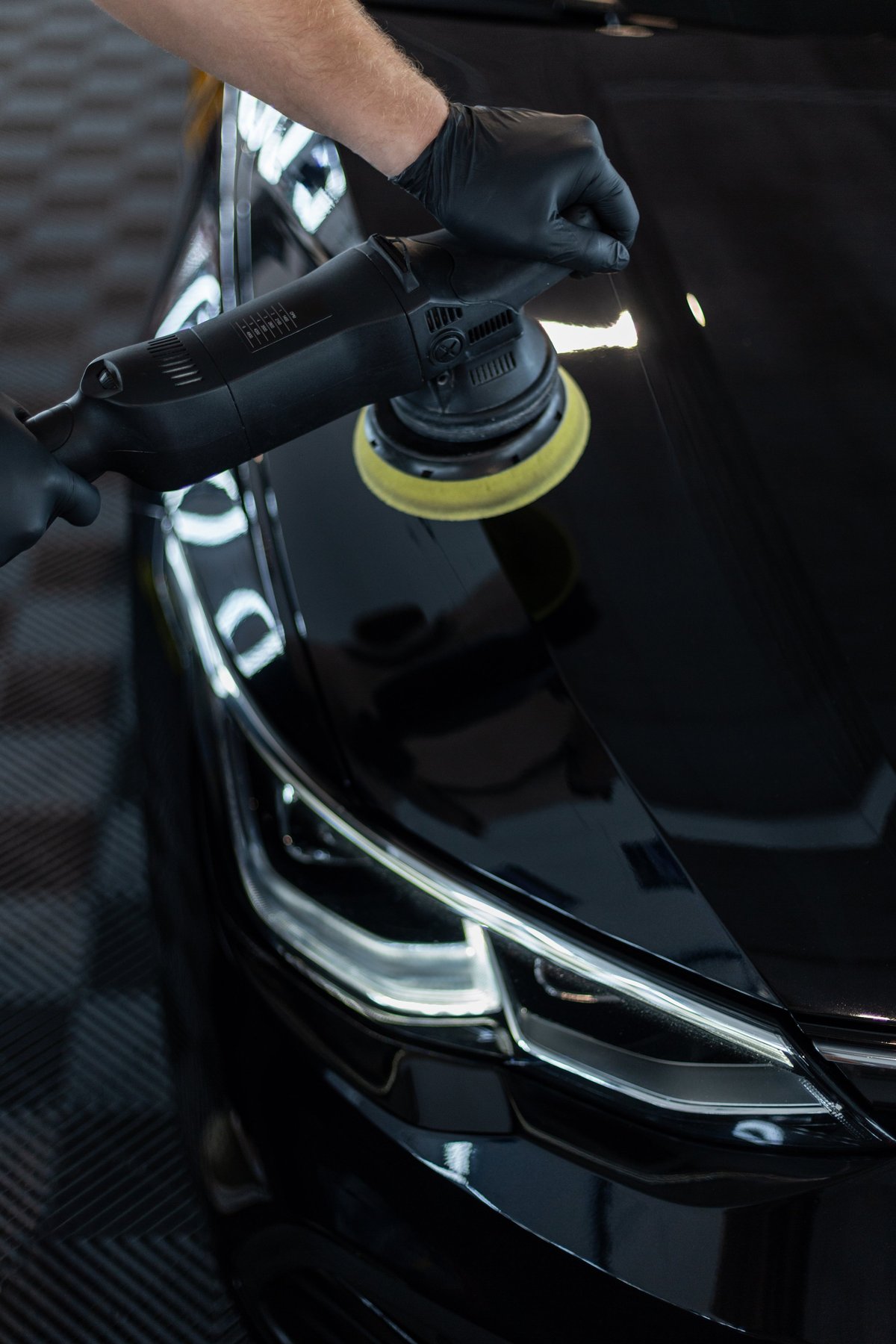 Polish Pros owner detailing a vehicle